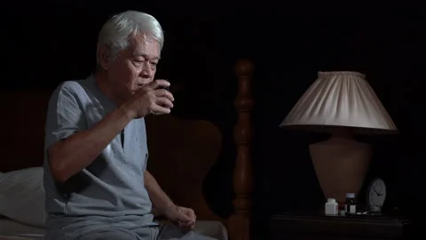 Depressed senior person cannot sleep from insomnia and taking medication Video stock 145674490