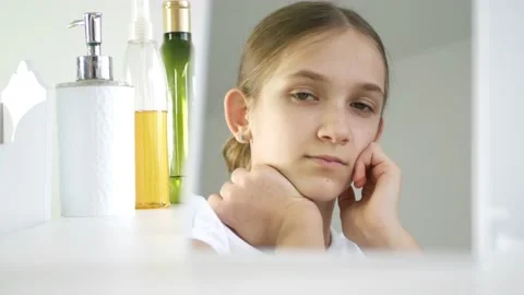 Depressed Teenager Girl Looking in Mirror, Unhappy Young Child Hair Dressed in Stock Footage
