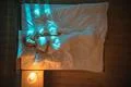 The depressed woman lie on the bed. Evening night time. View from above Photo