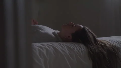Depressed Woman Lying On Bed Looking Up Then Closes Eyes Stock Footage 270332053
