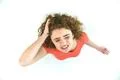 The depressed woman stand on the white background. View from above Photo