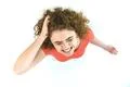 The depressed woman stand on the white background. View from above Photo