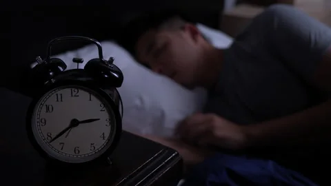 Depressed young Asian man cannot sleep from insomnia. Stock Footage 140905128
