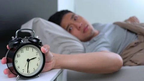 Depressed young Asian man cannot sleep from insomnia Видео 156638258