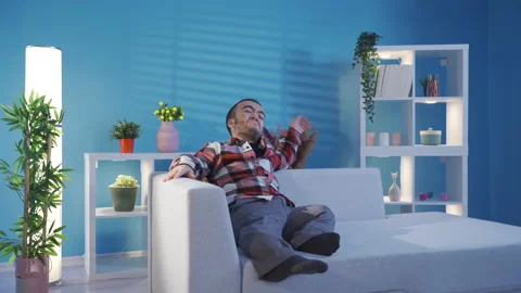 Depressed young man with dwarfism crying at home helpless and sad. Stock Footage 230971873