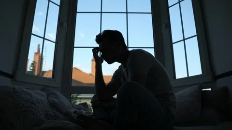 Depressed young man at home Stock Footage 281863600