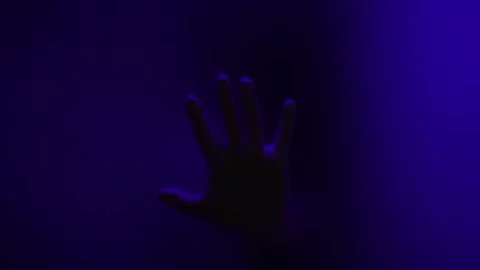 Depression concept. silhouette of man behind glass door. hands are placed on Stock Footage 254080805