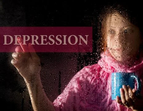 Depression written on virtual screen. young woman melancholy and sad at the Stock Photos