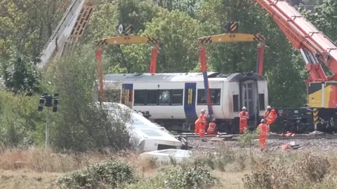 Derailed train in Lewes prepares to be moved from tracks following crash Video stock 342814848