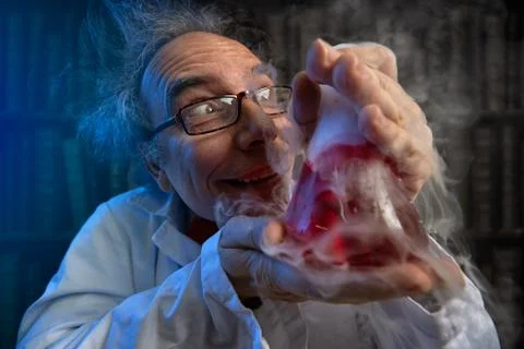 Deranged scientist obsessed with his experiments Stock Photos