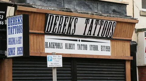 Dereks tattoo studio shutters down Stock Footage 47893110