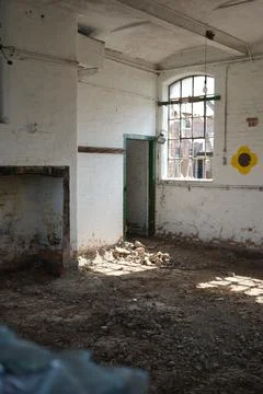 Derelict Industrial Interior With Broken Windows In Bulcote, Nottinghamshire, Stock Photos