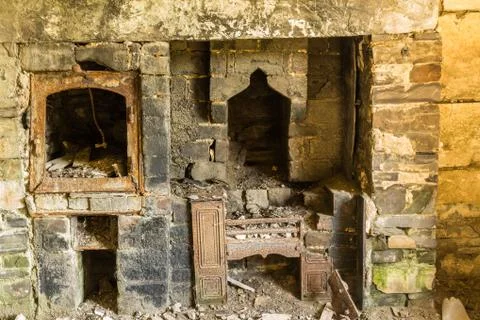 Derelict interior, fireplace Stock Photos