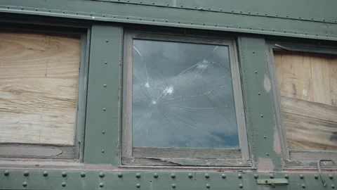 Derelict Train Car with Boarded and Broken Windows Stock Footage 313259383