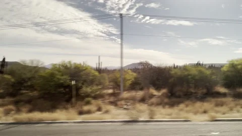 Deriver's side driving plate of desert and arid lands of Baja, Mexico Vídeo Stock 183009995