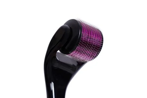Derma roller isolated on a white background. Stock Photos