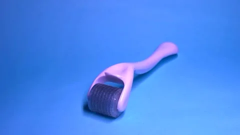 Derma roller for medical micro needling therapy. Dermaroller, mesopen. Stock Footage 303452819