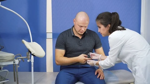 Dermatologist makes a procedure of removing warts and dark spots by nitrogen. Stock Footage 121701359