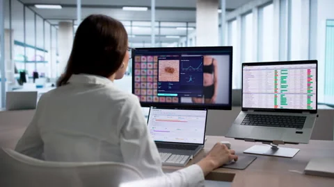 Dermatologist Uses Computer To Examine Mole Stock Footage 334532581