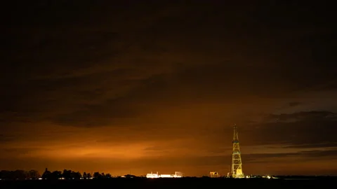 The derrick against of background of the cloudy .night sky. Stock Footage 160492480