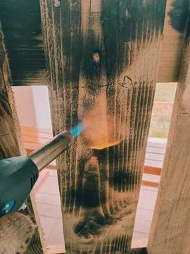Dervea and fire texture. fire and boards. wood fire treatment. The burner b.. Stock Photos