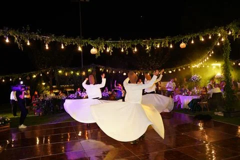 Dervish show on dance platform Stock Photos
