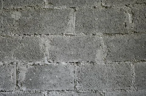 Desaturated wall brick wall panoramic view of stone and bricks. Hollow blocks Stock Photos