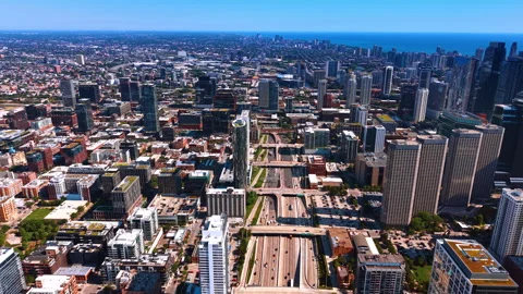 Descend over the large multi-lane highway crossing the scenery of Chicago, Stock Footage 338137996