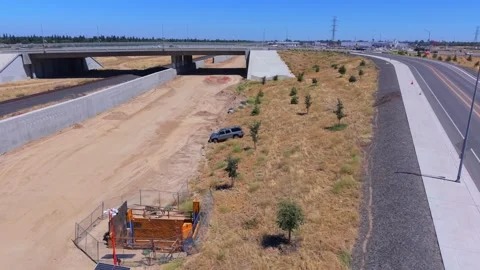 Descending Aerial Drone Shot, Crashed Car Near CA HSR, Fresno Видео 341877098