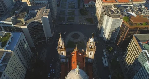Descending aerial looking down on the front towers and tile roof of historical Stock Footage 126112665