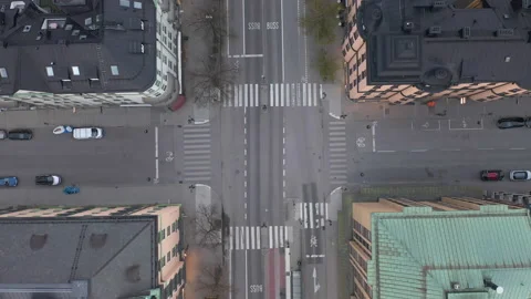 Descending aerial shot of empty intersection due to Covid 19 Coronavirus Stock Footage 131210905