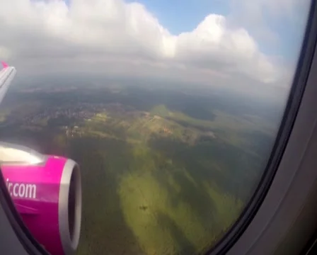 Descending aircraft shadow on ground clouds, wing turbine flight, click for HD Stock Footage 43966633