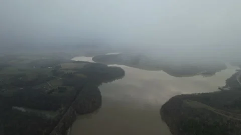 Descending from Clouds over Lake Stock Footage 171731083