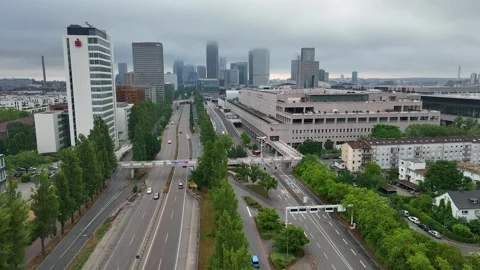 Descending dolly flight over a street in Frankfurt, shrouded in morning fog Stock Footage 329921853