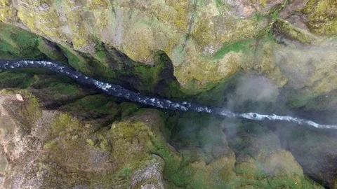 Descending down to a canyon with river and birds in Iceland (4k drone footage) Stock Footage 88771983