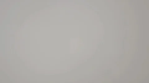 Descending down from the clouds to a flyover of fields in rural Nepal. Stock Footage 113604709