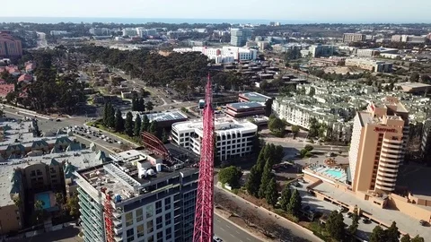 Descending drone at the end of long crane boom Stock Footage 84948647