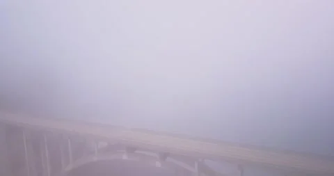 Descending Drone next to Bridge and Ocean Stock Footage 134282801