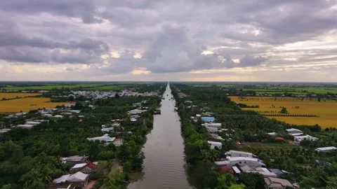 Descending drone shot over an endless straight river canal Stock Footage 337700877