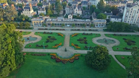 Descending Drone Shot over Parc du Thabor in Rennes at Sunrise, France Stock Footage 321379928