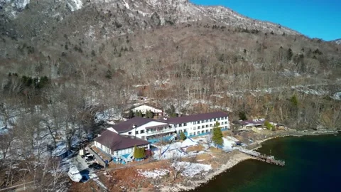 Descending Drone Shot Over Winter Lake Hotel Vidéo 336811893