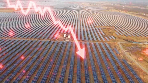 Descending-drone-solar-farm-falling-energy-prices-financial-chart Stock Footage 344239507