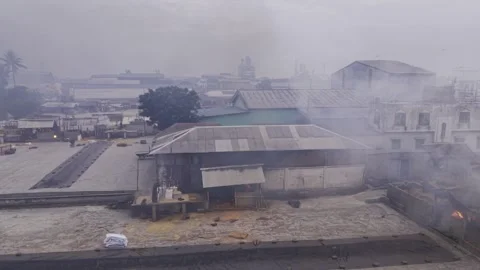 Descending Drone View of Manual Rice Processing at Khajanagar Rice Mill Stock-Footage 346218969