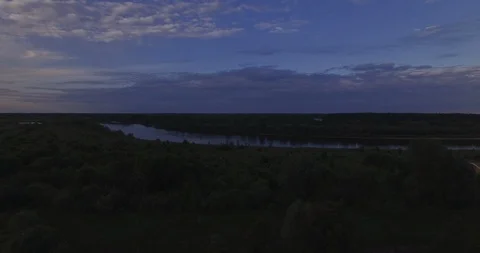 Descending fly over trees river evening 스톡 동영상 108744643