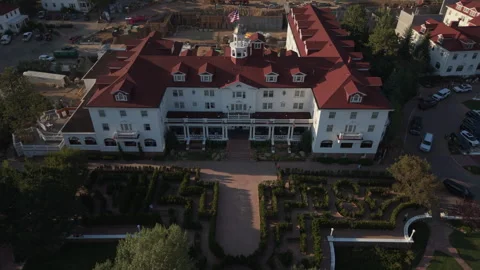 Descending frontal view of landmark Stanley Hotel in Estes Park, CO Stock Footage 341237397