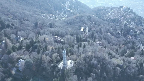 Descending on the lighthouse over the Lake Como Stock Footage 296097414