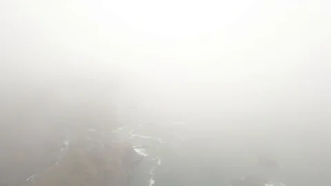 Descending from out of a cloud Video stock 100135370
