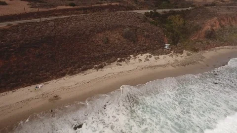 Descending Over Beach Aerial Stock Footage