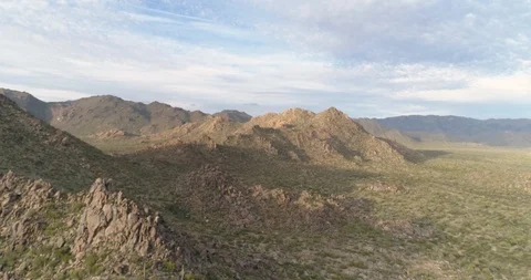 Descending over the front-range of the Date Creek Mountain Range Stock Footage 127114049
