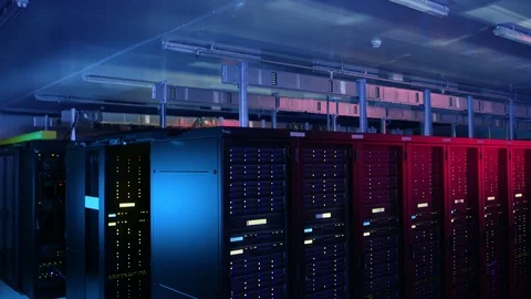 Descending Shot of Data Center With Multiple Rows of Operational Server Rack Stock Footage 101221785